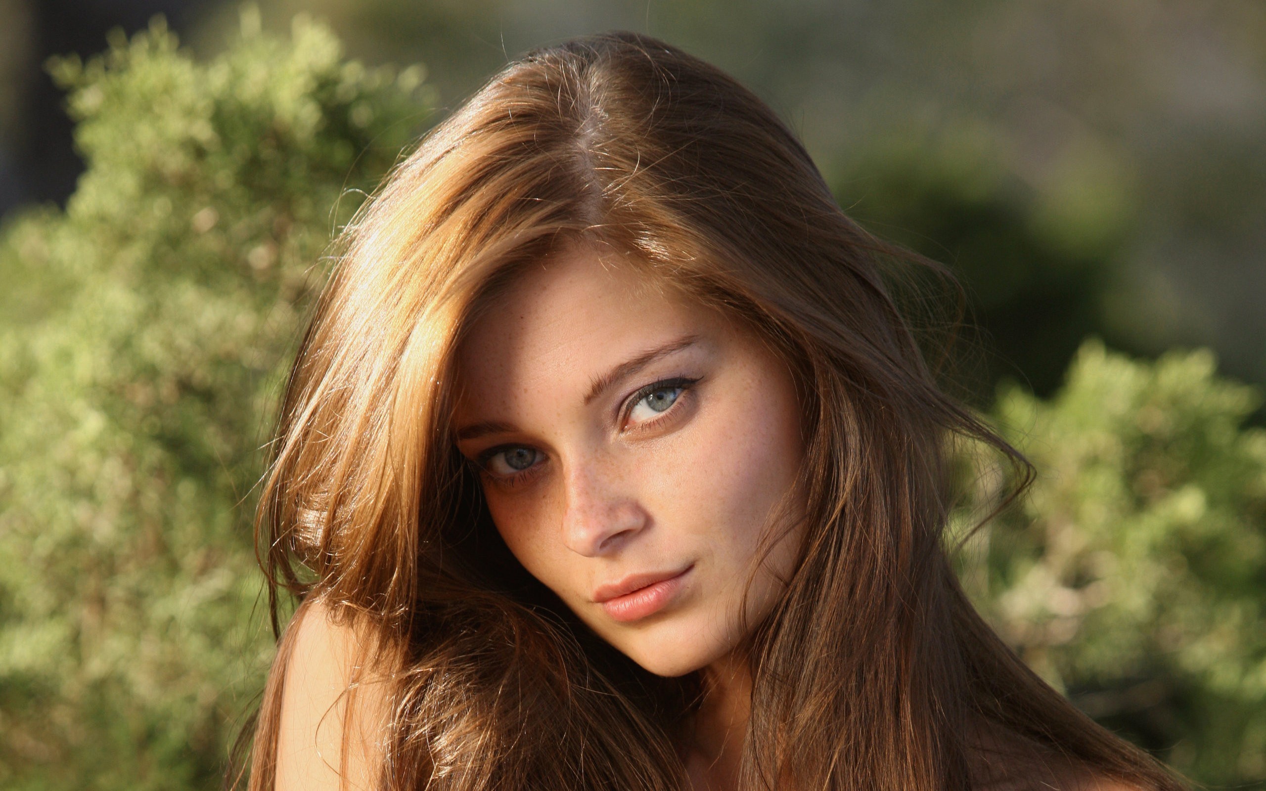 Indiana A women model freckles long hair brunette