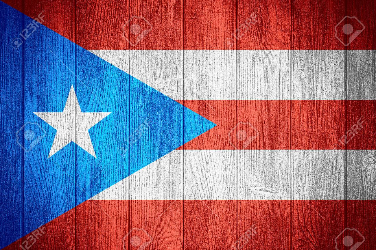 Puerto Rico Flag Or Rican Banner On Wooden Boards