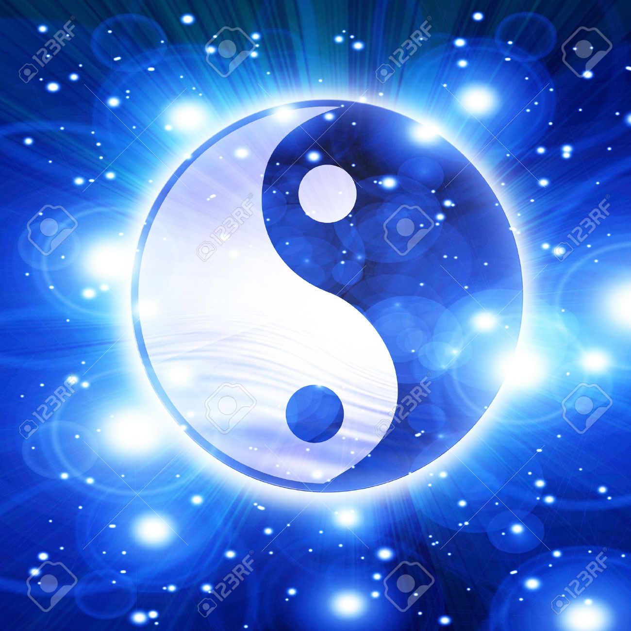 Yin Yang Symbol On A Soft Blue Background Stock Photo Picture And