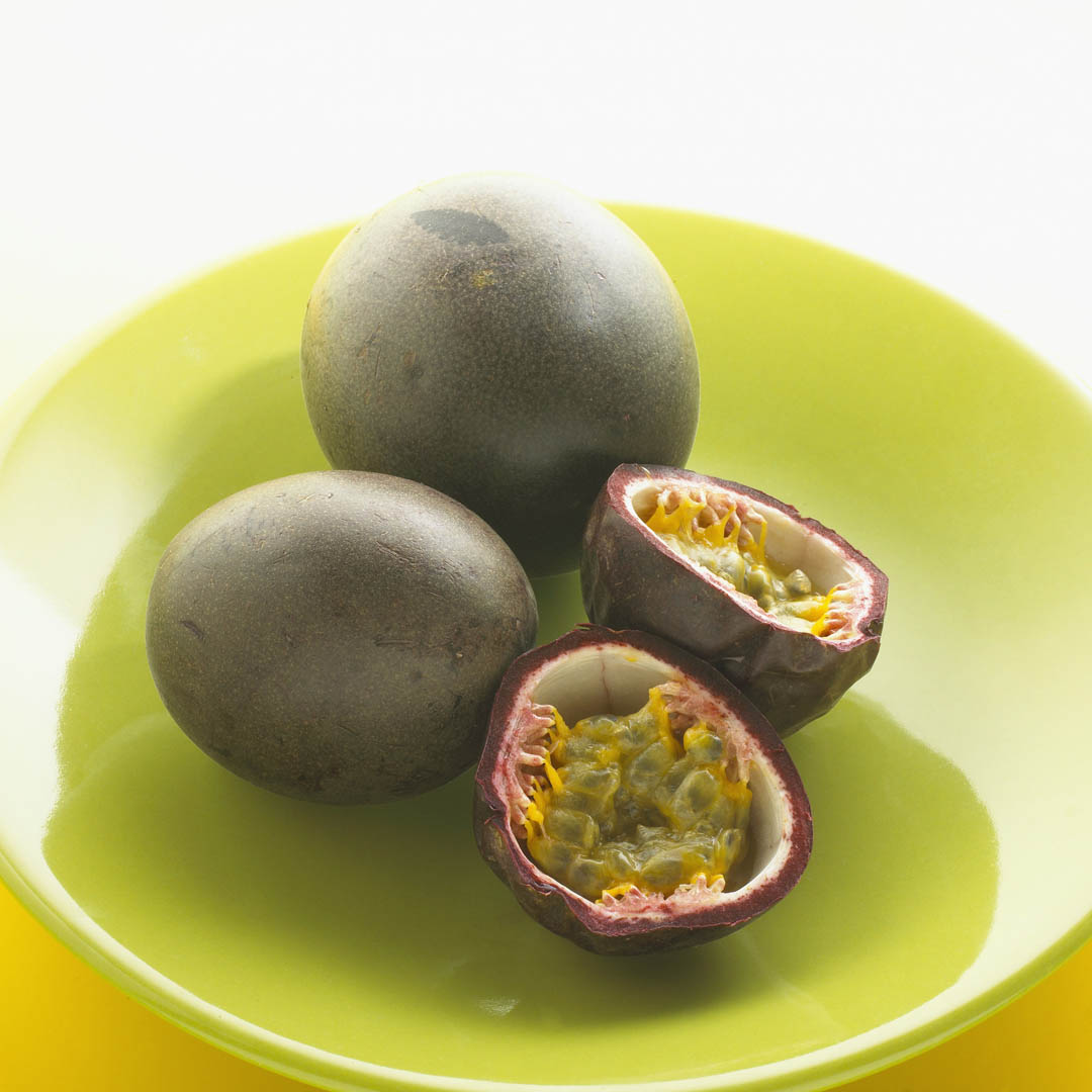 Whole And Halved Passion Fruit Wallpaper