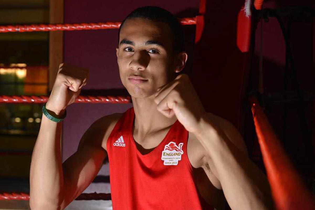 Benjamin Whittaker, English boxer, posing in a fighting stance inside a boxing ring