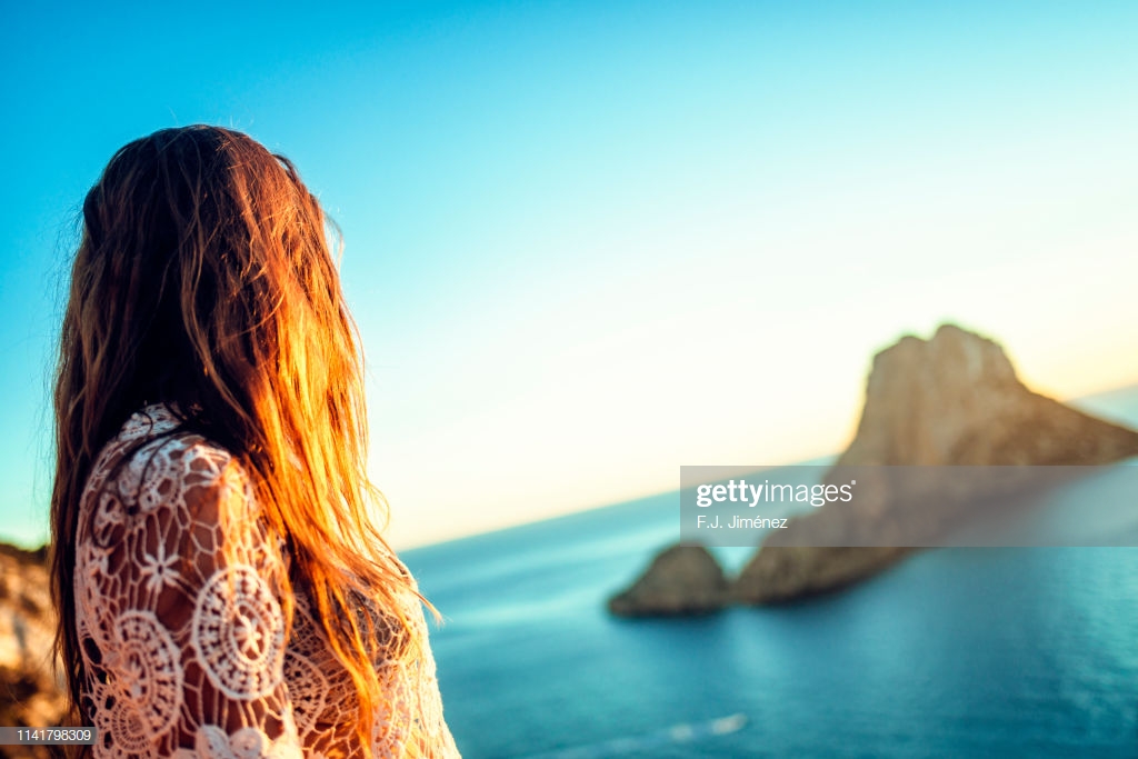 Woman With Es Vedra In The Background Ibiza Spain Stock Photo