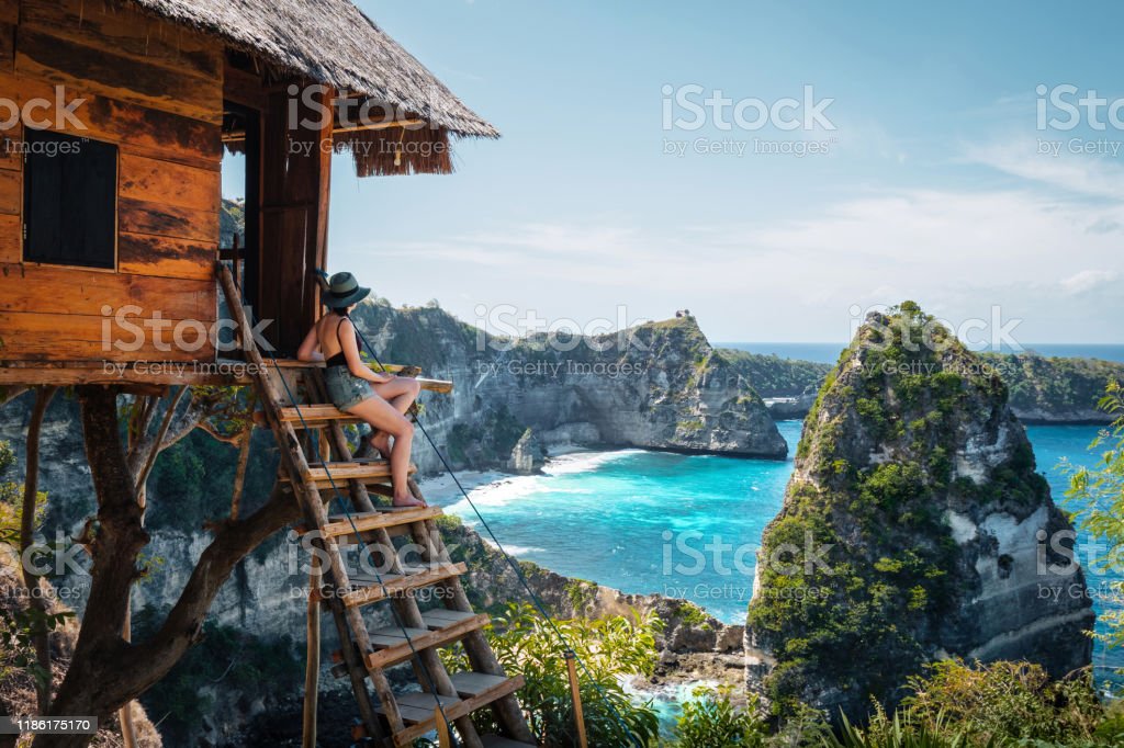 Bali Indonesia Traveler On Tree House At Diamond Beach In Nusa
