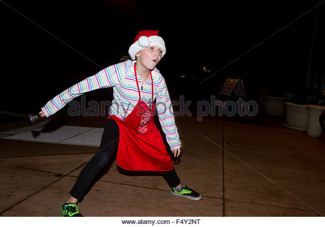 Salvation Army Volunteer Dancing And Doing Handstands With Her Bell