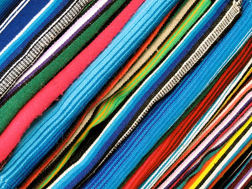 Mexican Blanket Background A stack of mexican blankets