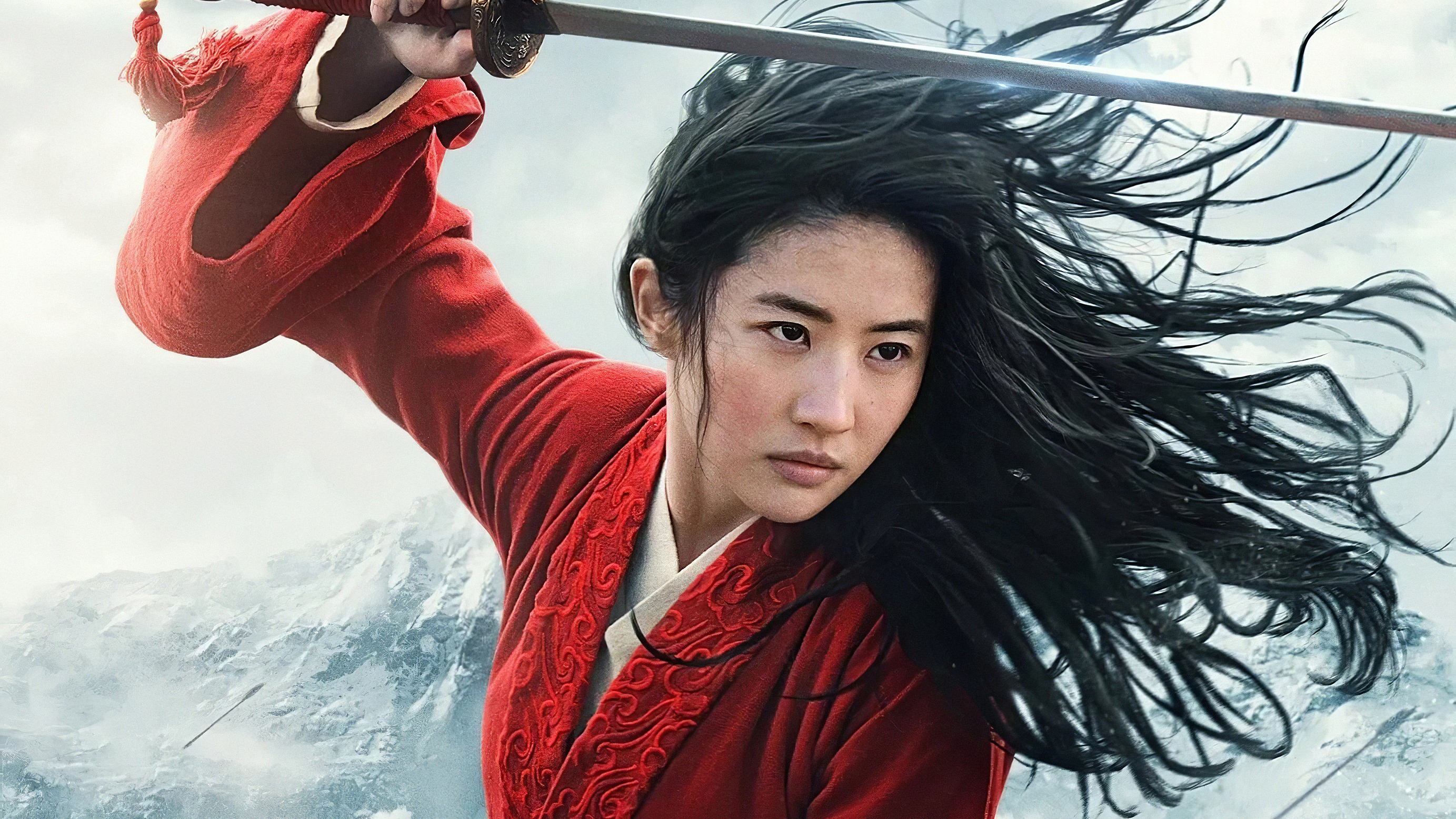Mulan wielding a sword in a snowy mountain landscape