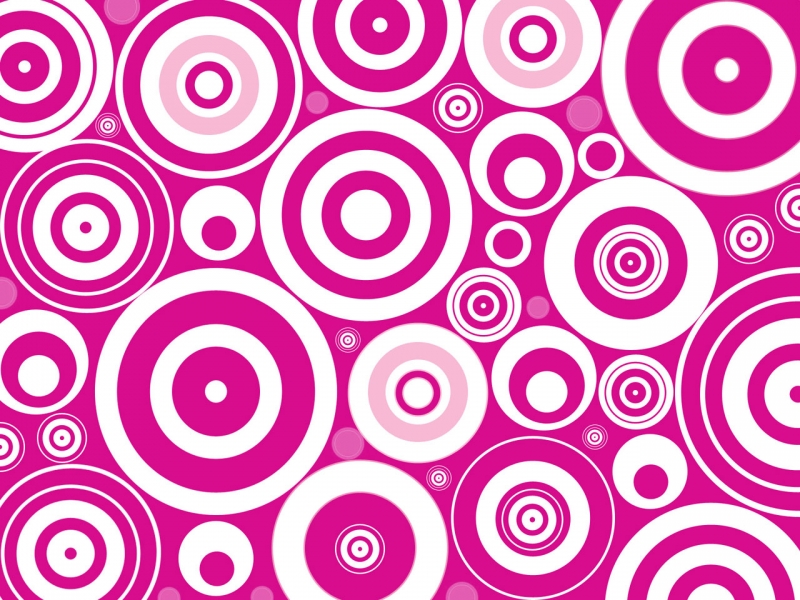 White retro circle patterns on a hot pink background