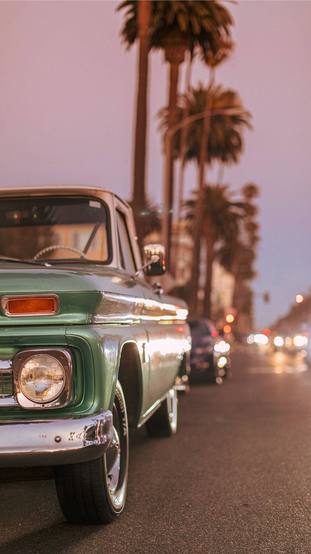 Metallic Green Car Retro Aesthetic iPhone Wallpaper
