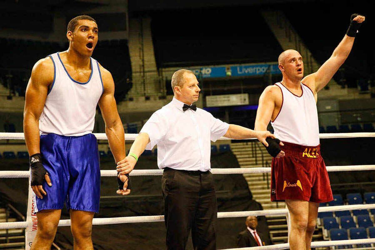 Benjamin Whittaker, the British boxer, stands in the ring during a match