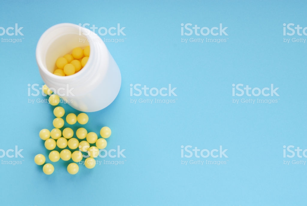 Vitamin C Ascorbine Acid Pillsballs On Blue Background Stock Photo