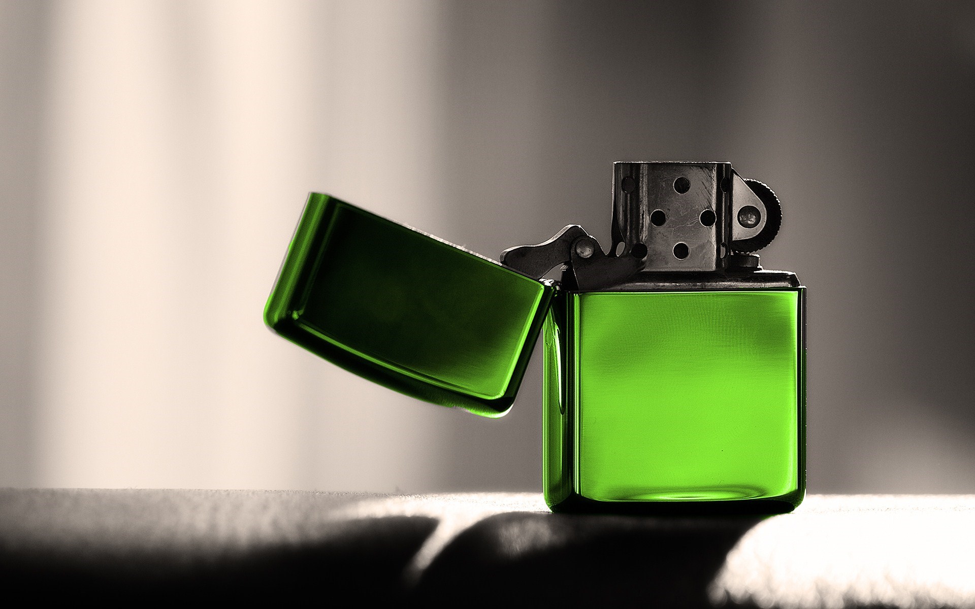 Green Zippo Lighter Close Up Photo