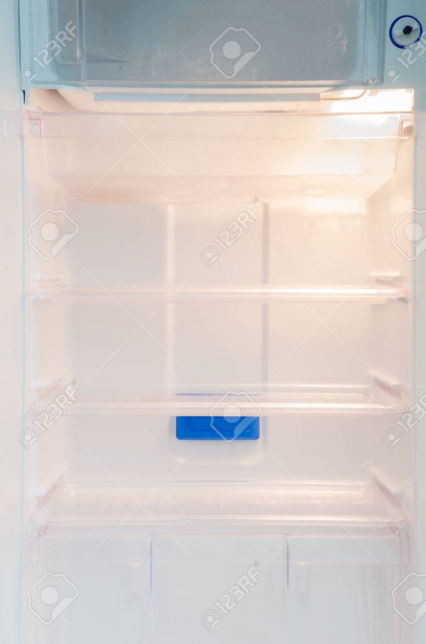 Opened And Empty Inside White Refrigerator Background Of Regular