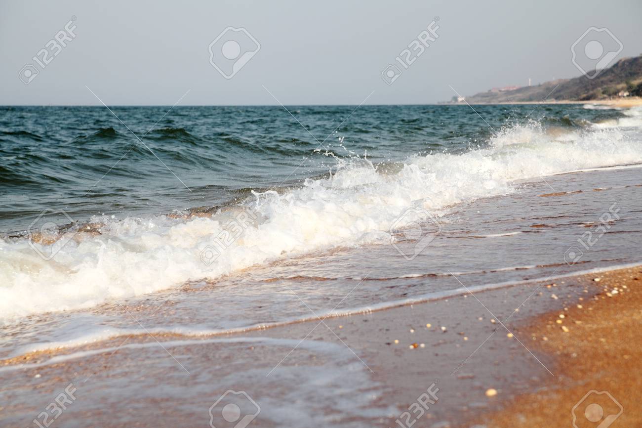 Stormy Sea Background Waves And Splashes Sandy Beach Stock Photo