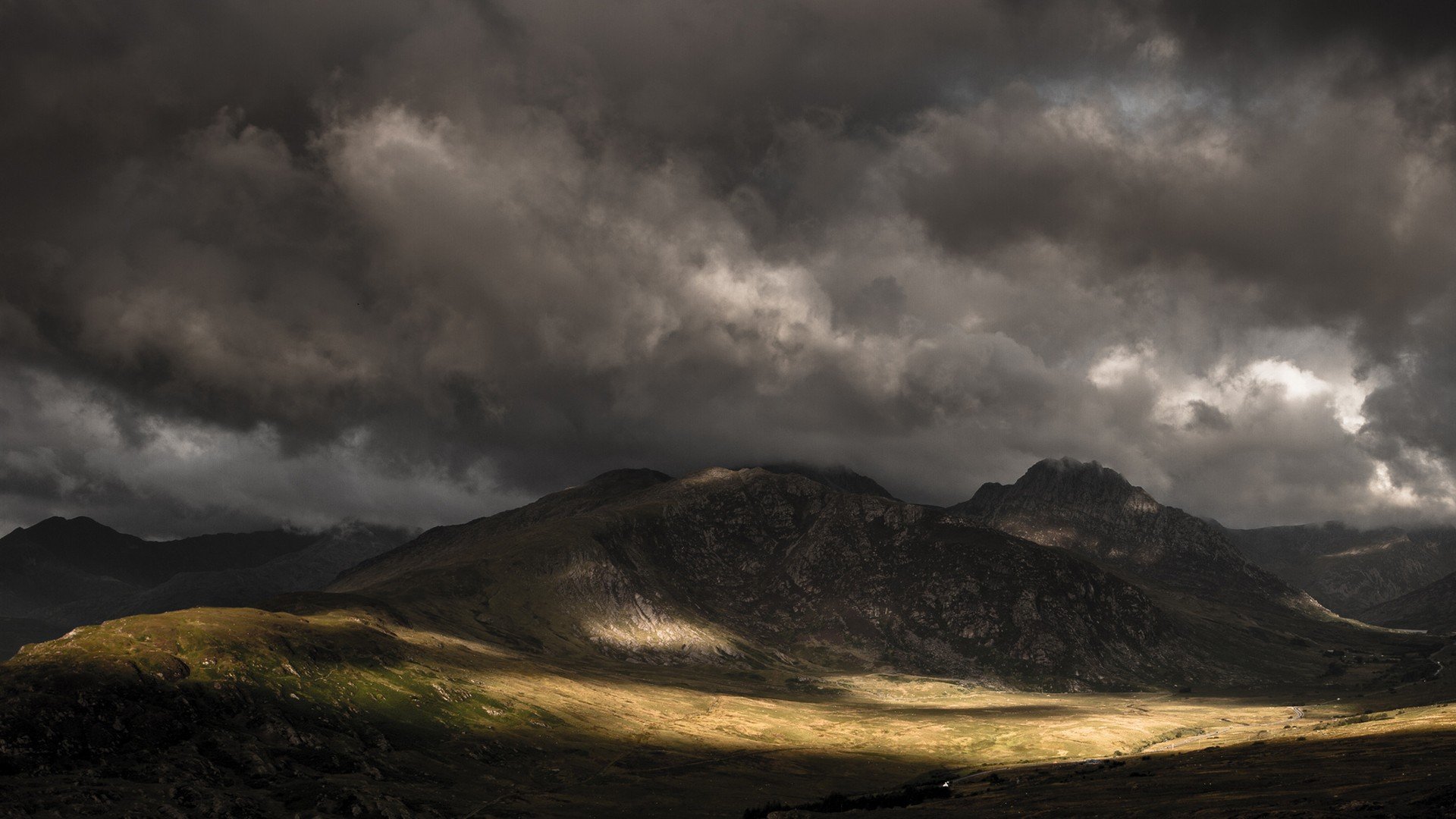 Dark clouds over the mountains wallpapers and images   wallpapers