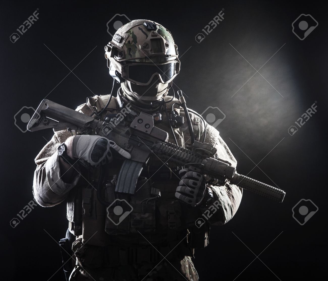 Special Forces Soldier With Rifle On Dark Background Stock Photo