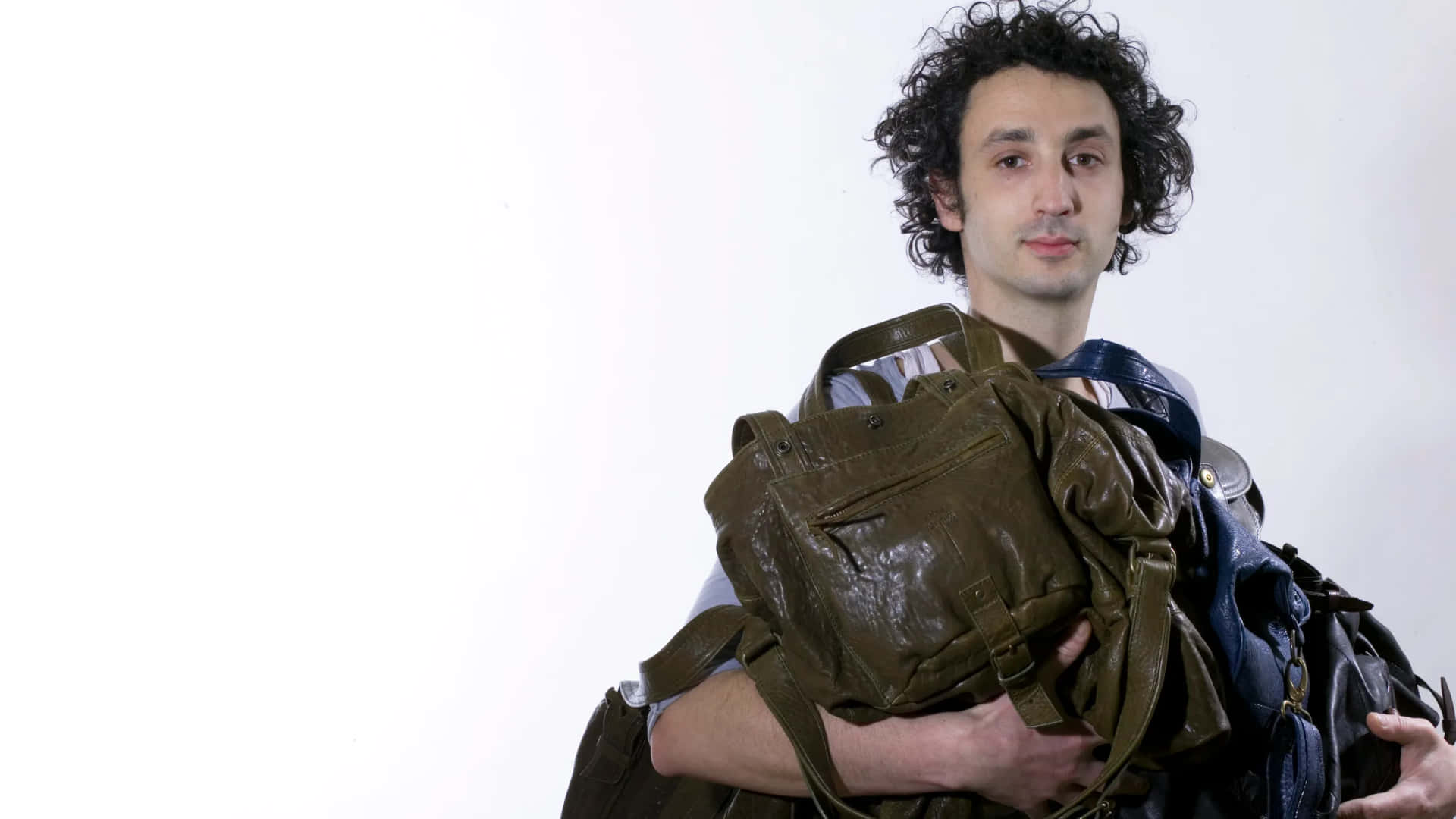 J R Me Dreyfuss Carrying His Bags Wallpaper