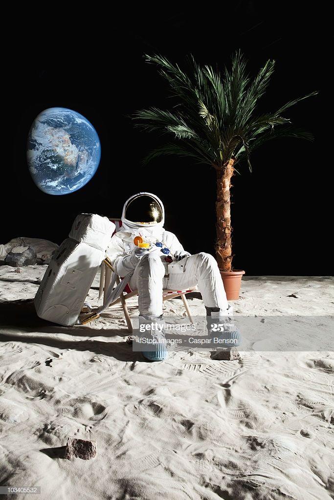 An astronaut on the moon relaxing in a beach chair Astronaut