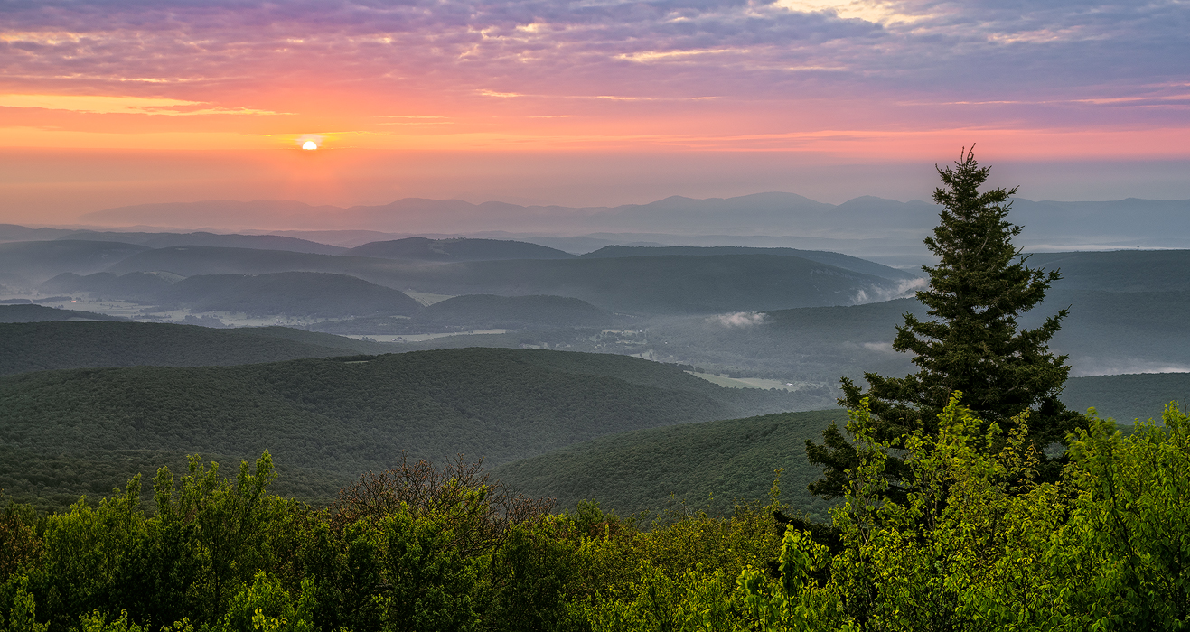 Hazy Sunrise Over The Appalachian Mountains Bear Rocks Preserve Wv