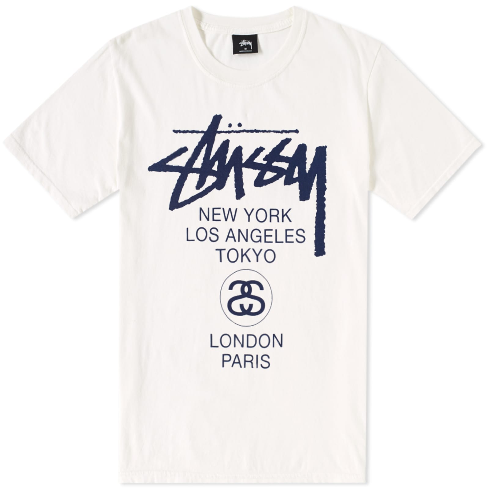 Stussy T-Shirt with World Tour Graphic on Off-White Background
