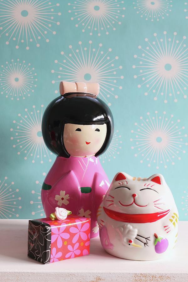 Japanese Doll Money Box Oriental Lucky Cat And Gift Against