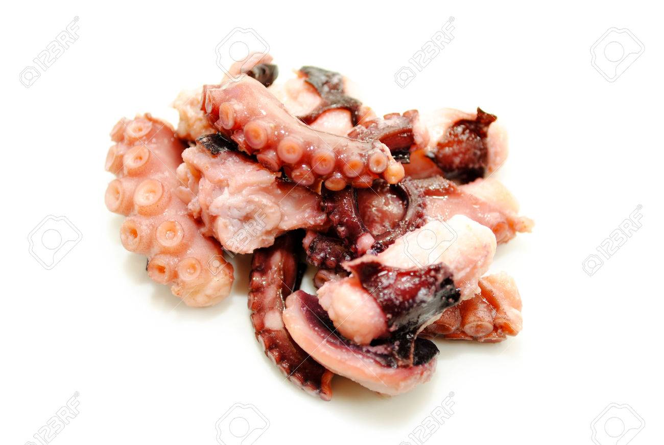 Chopped Cooked Octopus Over A White Background Stock Photo