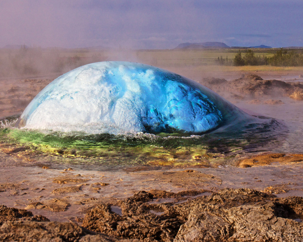 Strokkur Geyser Water Explosion Geothermal Area Along The River