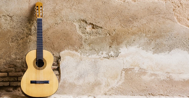 Spanish Guitar On Wall Wallpaper Decor