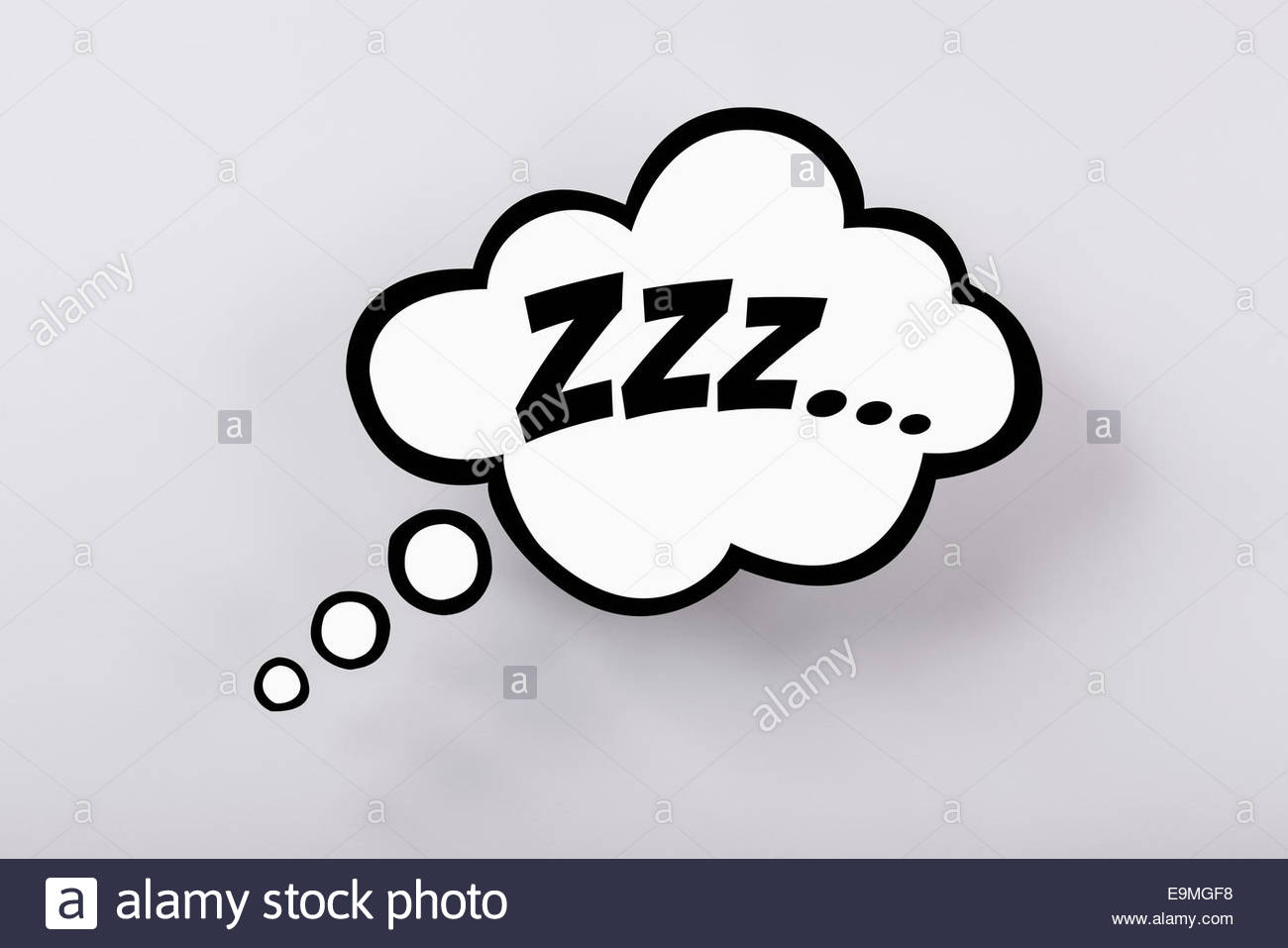 Snoring Sign In Thought Bubble Against Gray Background Stock Photo