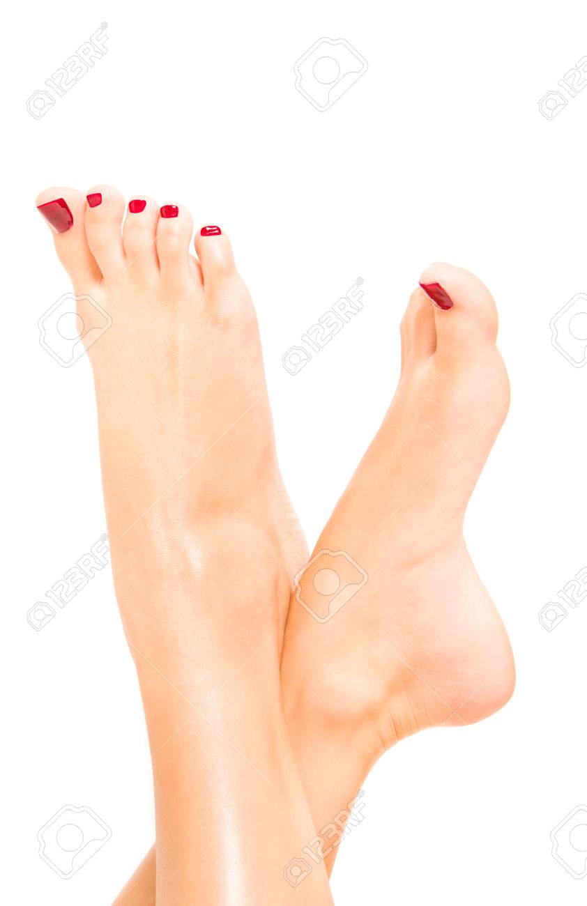 Beautiful Female Feet With Red Pedicure Isolated On White