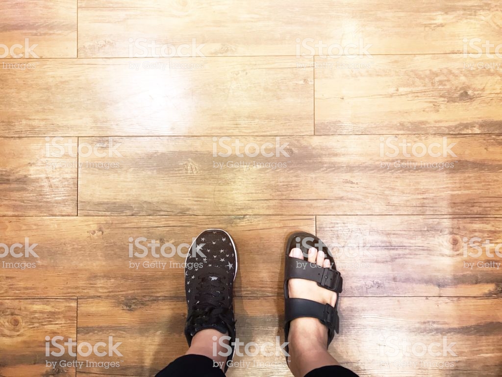 Top Of Selfie Feet On Wooden Floor Background Decision Making