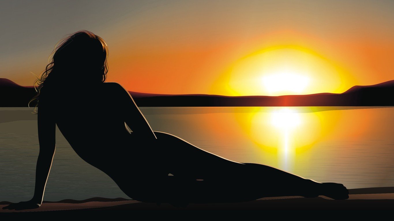 Download Womans silhouette in the sunset wallpaper