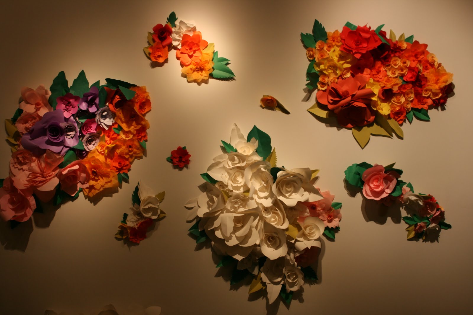 part of her paper rose installation at a gallery in North Portland