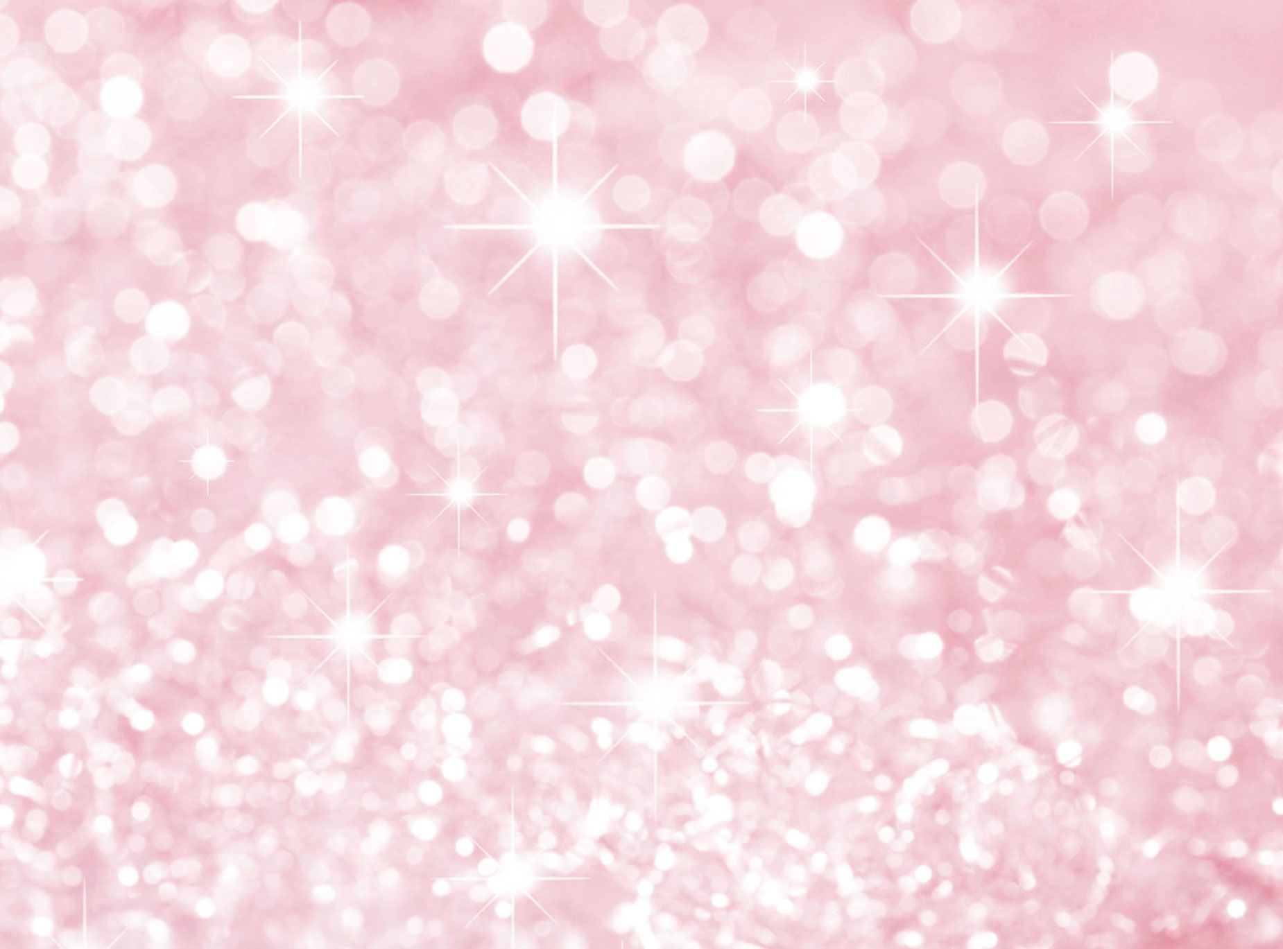 Sparkling pink glitter background with bokeh effect, perfect for a girly or festive design