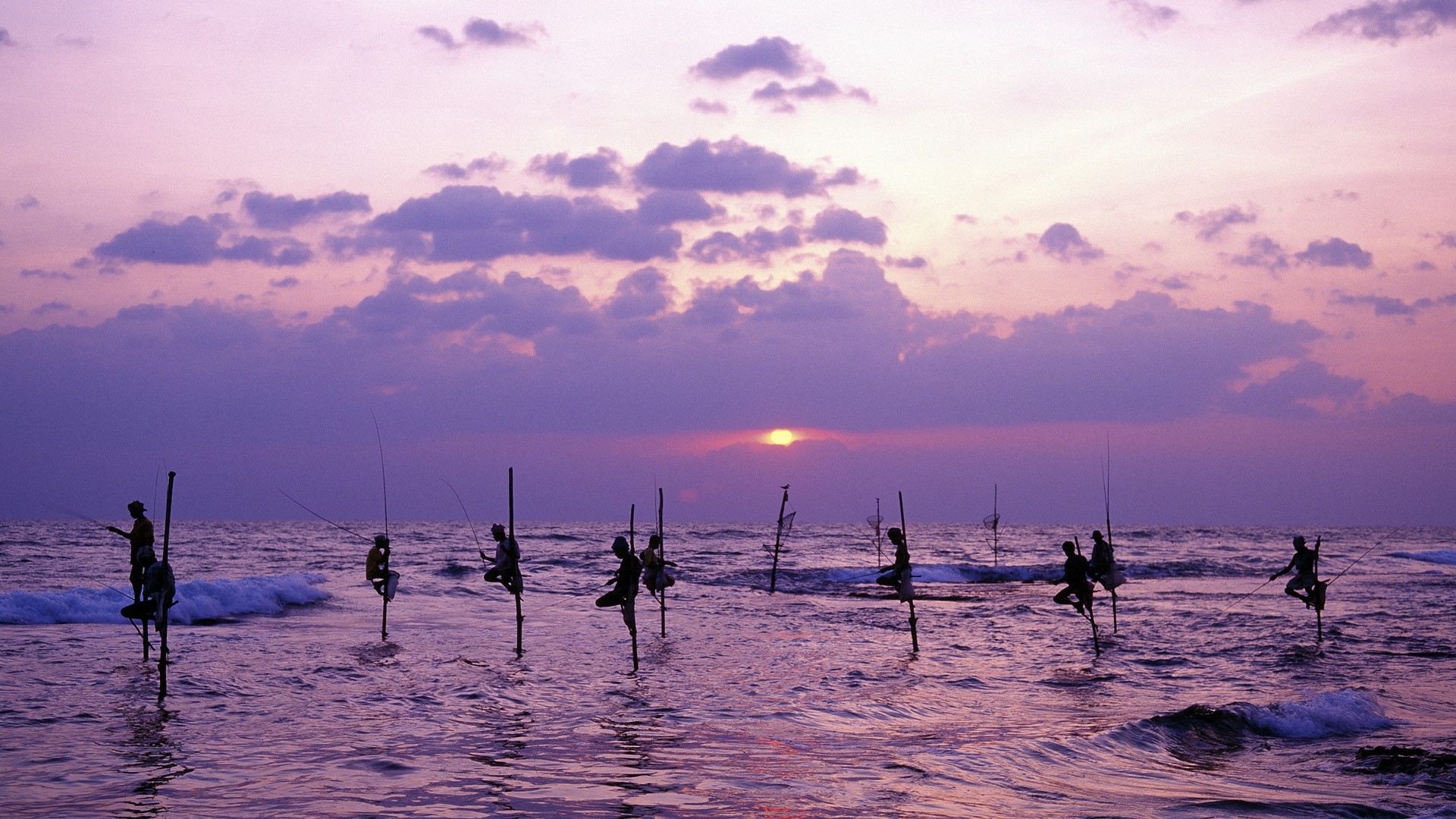 Stunning Fisherman At Dusk Wallpaper