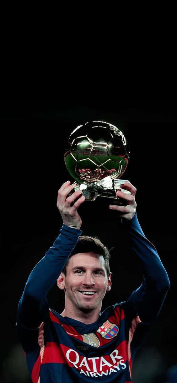 Download Messi Iphone Presenting Ballon Dor Wallpaper