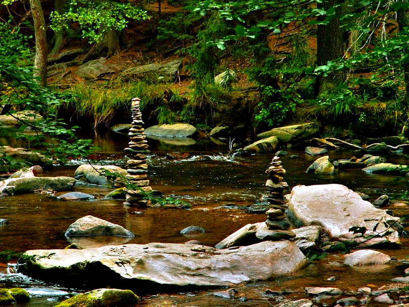 Rocks Stacked In A Stream Wallpaper
