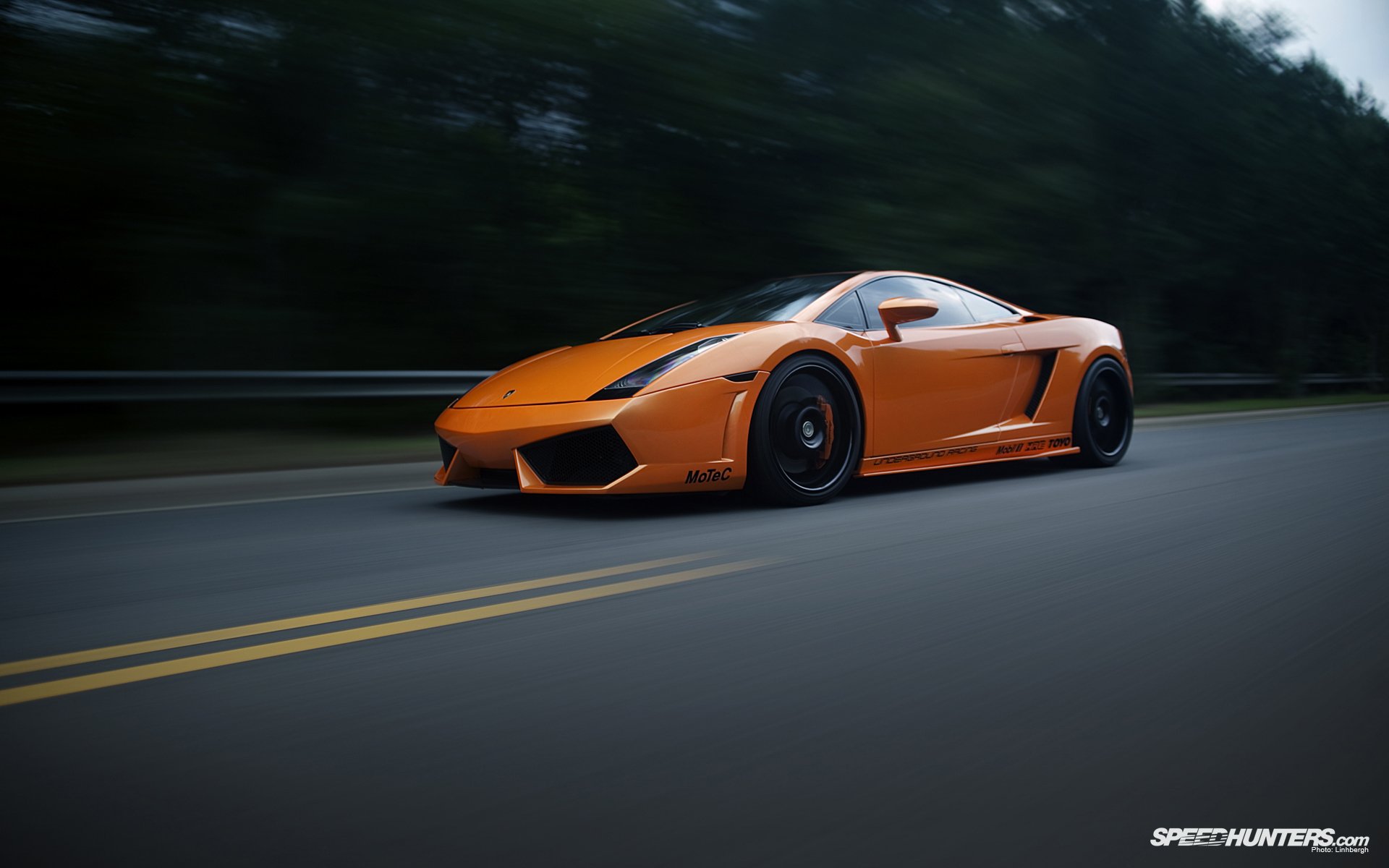 Orange Lamborghini Gallardo Speeding Down a Highway