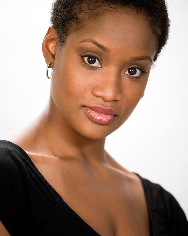 Beautiful African American Woman With Short Afro On White Background