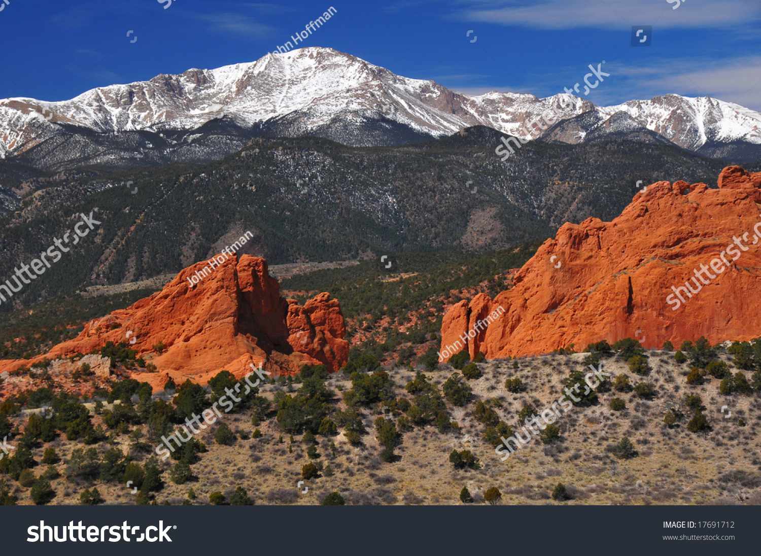 Snow Capped Pikes Peak Soaring Over Stock Photo