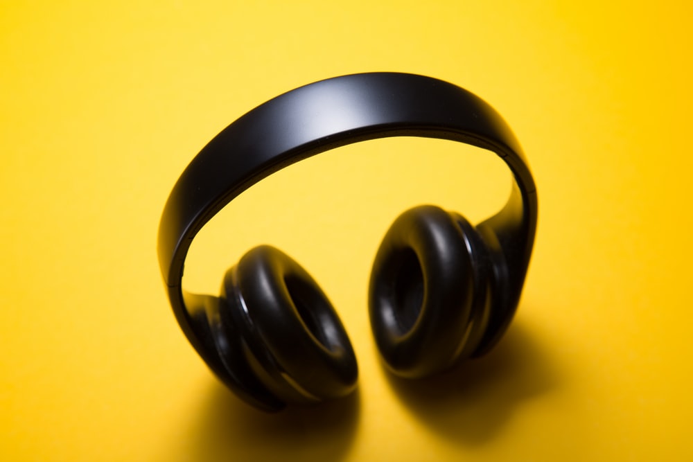 Wireless Headphones With Yellow Background Photo Music