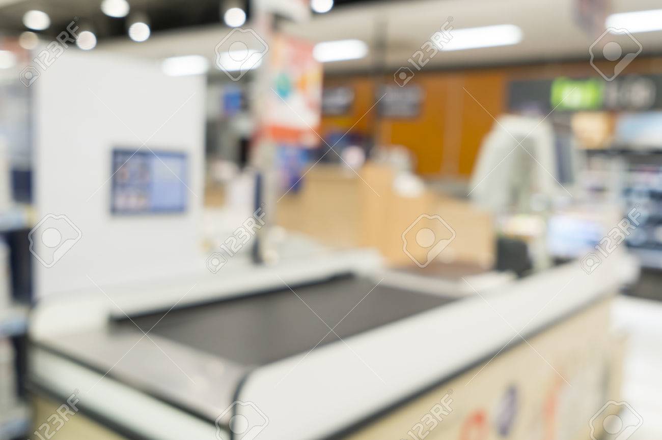 Blurred Image Of Suppermarket Cashier For Background Uses Stock
