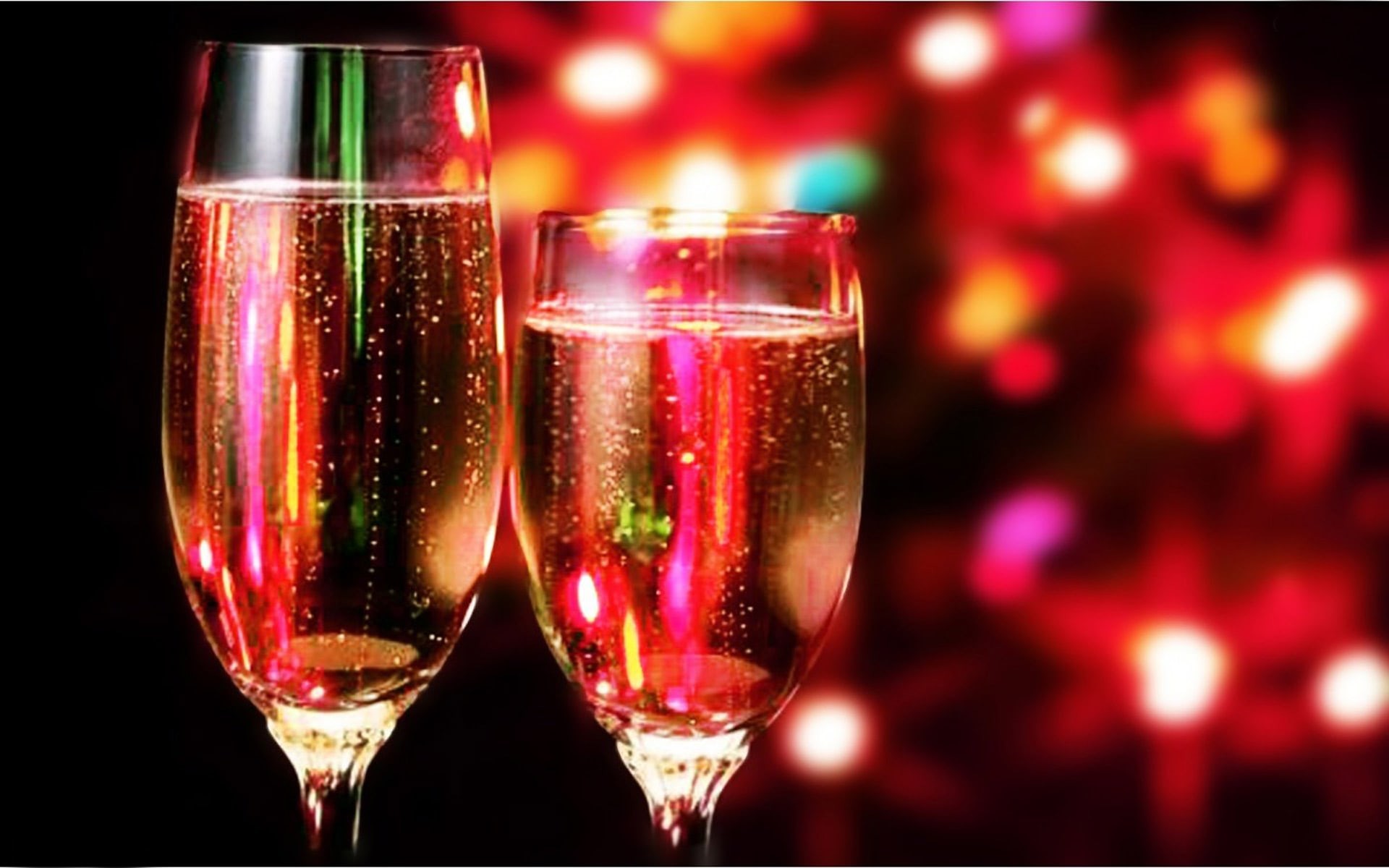 Two champagne flutes filled with bubbly against a blurred background of festive red Christmas lights create a celebratory New Year's Eve atmosphere