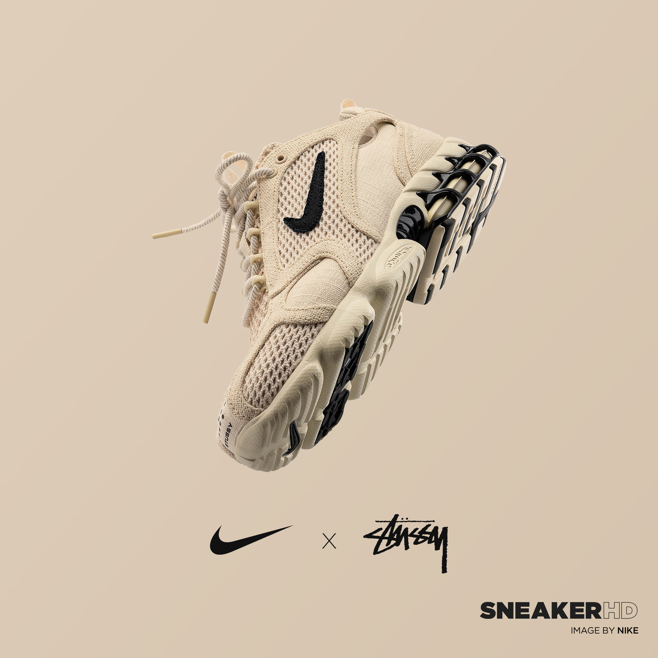 Close-up of a Stüssy x Nike sneaker collaboration, showcasing the shoe's design and neutral colorway