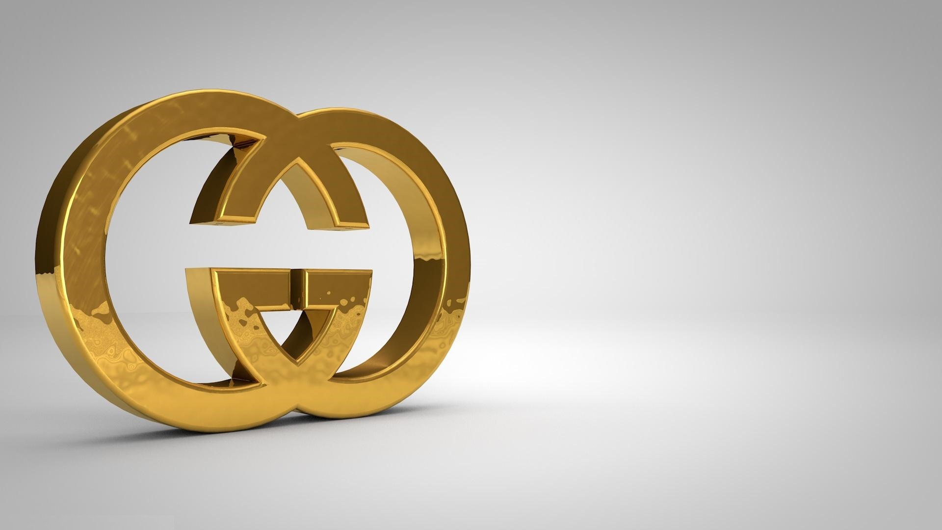 Gold Gucci Logo on a White Background