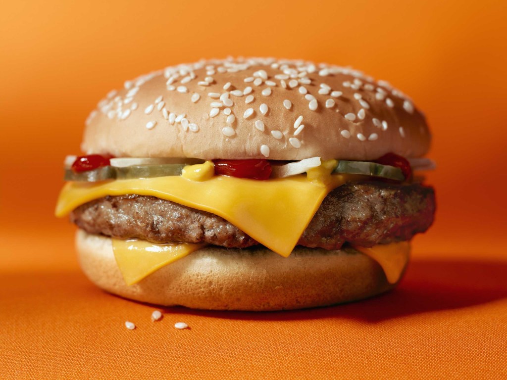 Testy Burger With Orange Background For Desktop