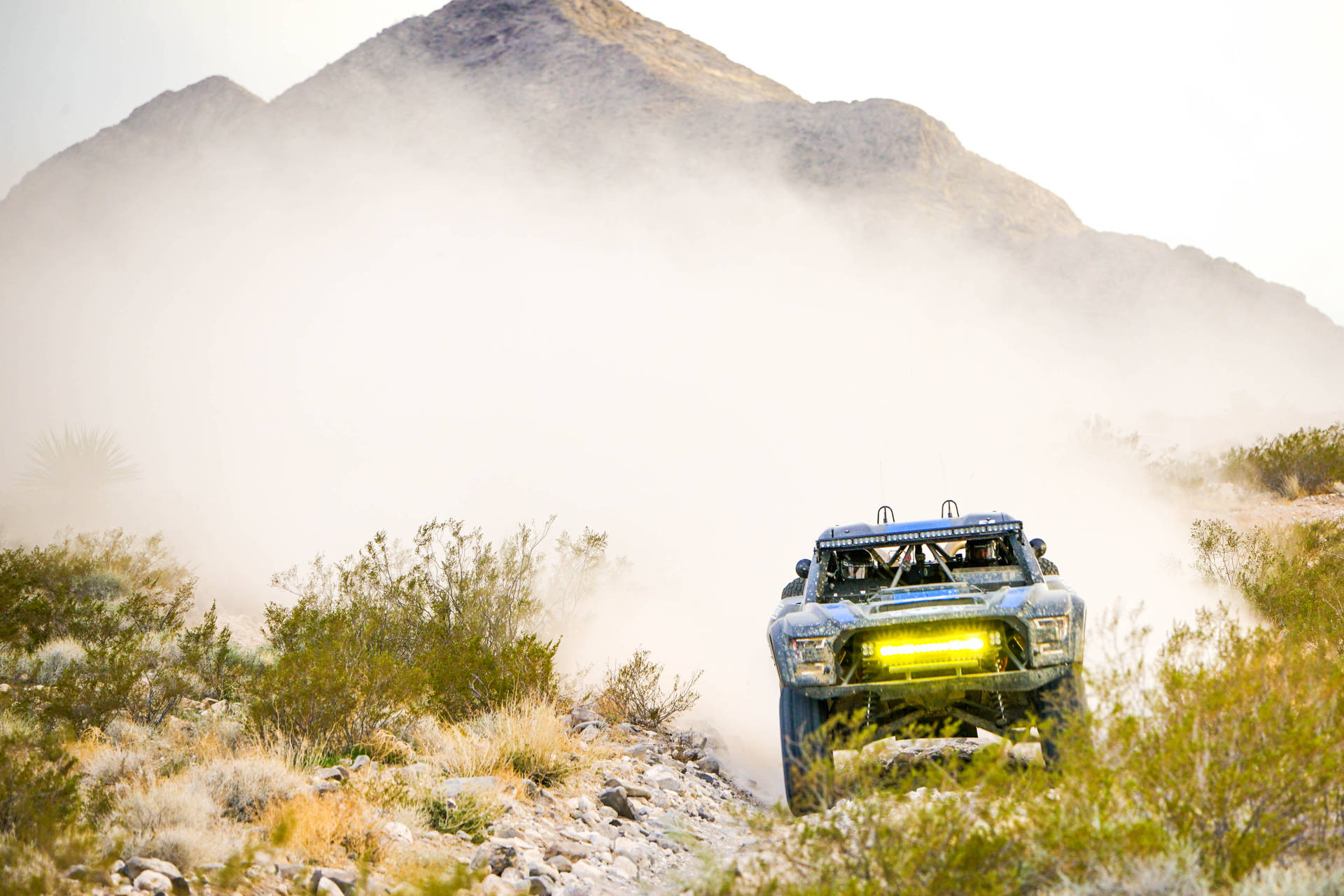 Dirt Rally Car With Yellow Headlamp 22feh8rrb5p3nl18 Wallpaper