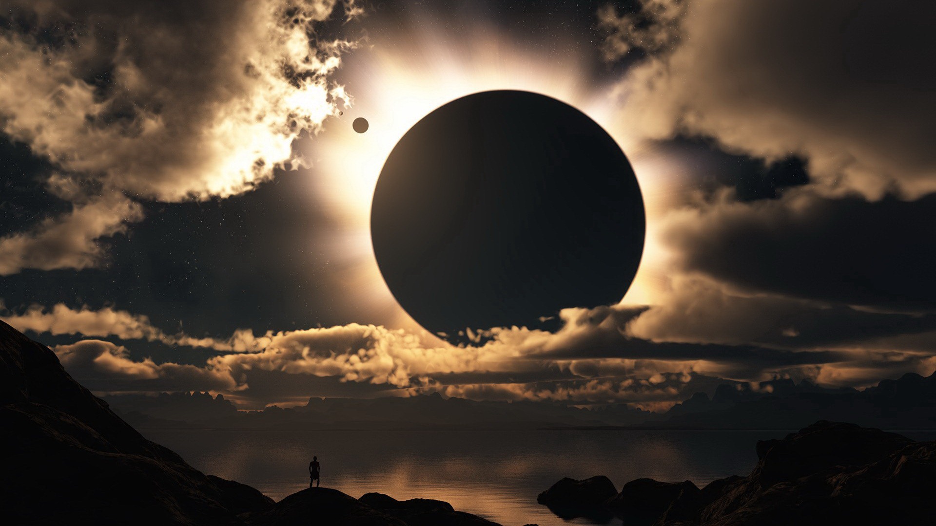 A silhouette of a person stands on a rocky shore, gazing at a breathtaking solar eclipse over a tranquil body of water. The sky is a mix of dark clouds and the radiant glow of the eclipsed sun
