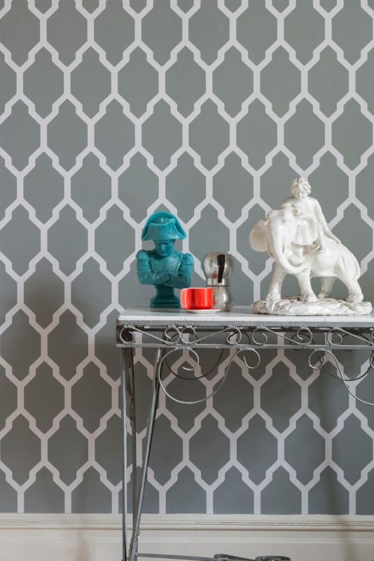 Tessella Wallpaper A large bold geometric repeat design in dark grey