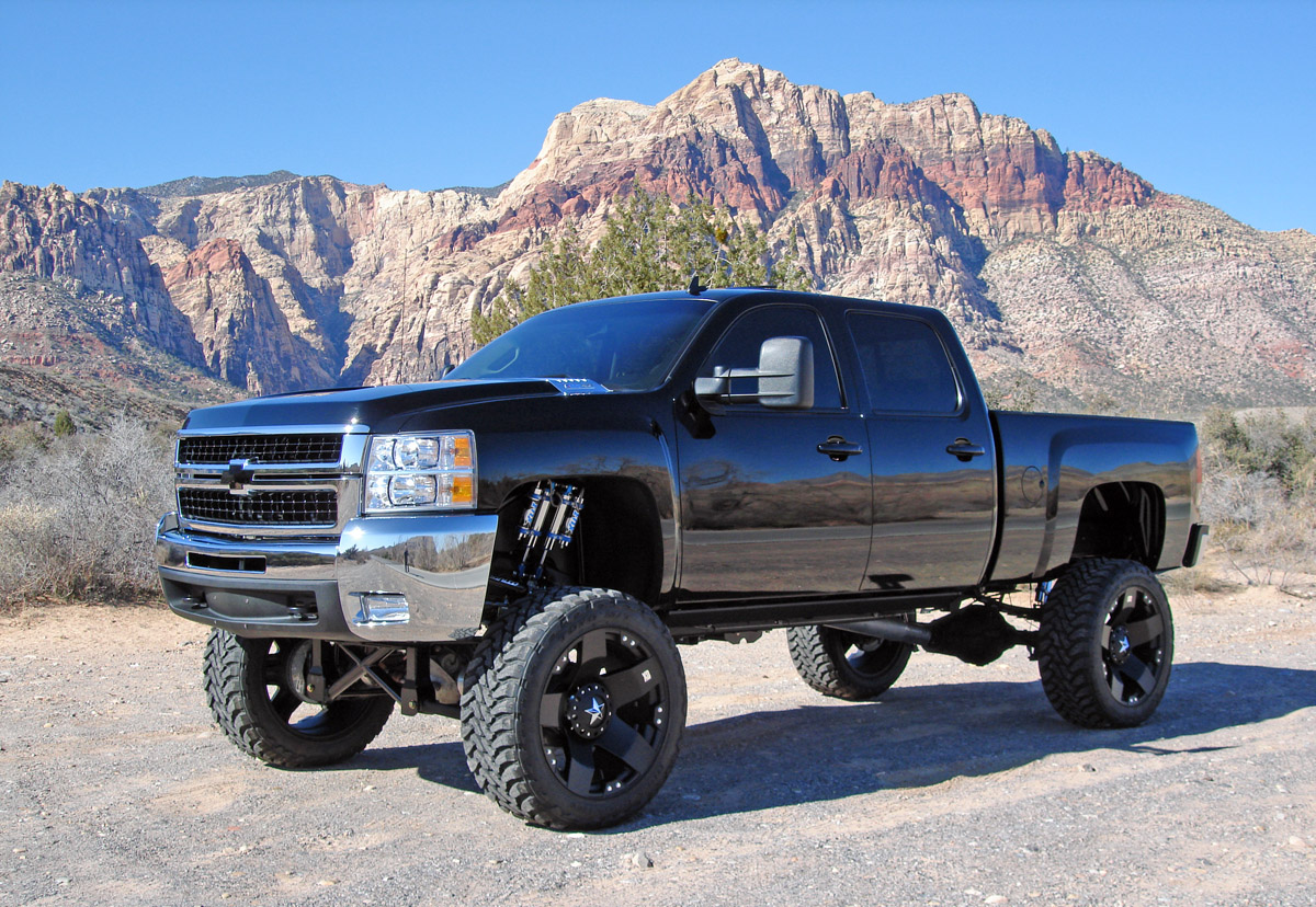 Lifted Trucks With Stacks Mudding Image Wallpapers