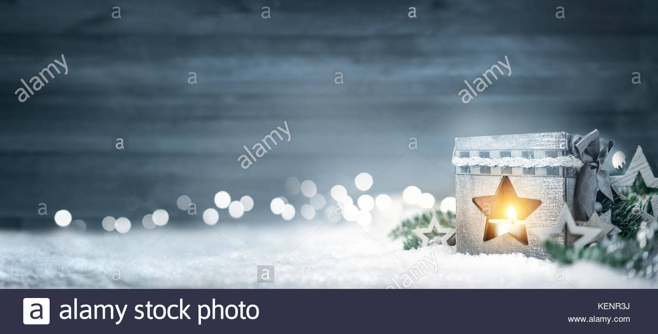 Christmas Background In Cool Winter Colors With A Shining Lantern
